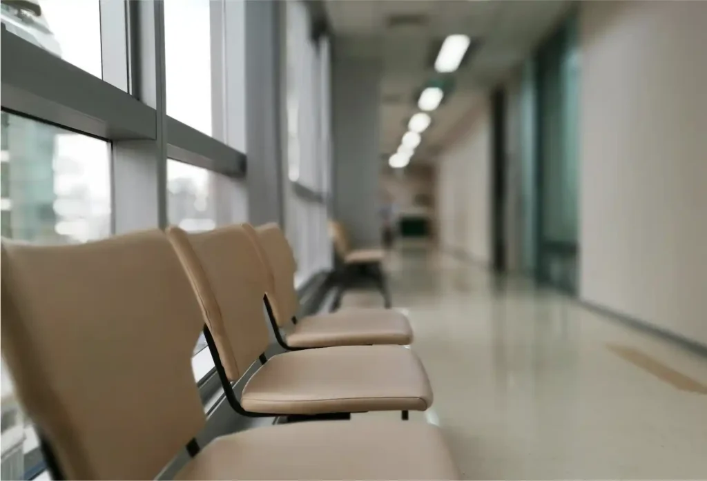 empty leather chairs in a reception area of a therapists office